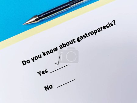 Foto de A person is answering question about diabetes. He knows about gastroparesis. - Imagen libre de derechos