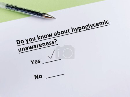 Foto de A person is answering question about diabetes. He knows about hypoglycemic unawareness. - Imagen libre de derechos