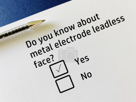 Photo for One person is answering question about electronics. He knows about metal electrode leadless face. - Royalty Free Image
