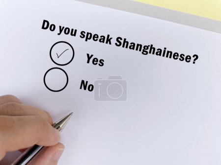 Photo for One person is answering question about languages. He speaks shanghainese. - Royalty Free Image