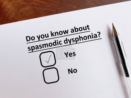 Photo for One person is answering question about ENT disease. He knos about spasmodic dysphonia. - Royalty Free Image