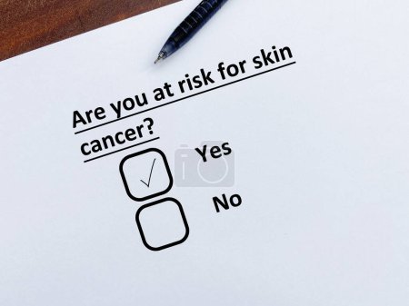 Photo for One person is answering question about ENT disease. He is at risk for skin cancer. - Royalty Free Image