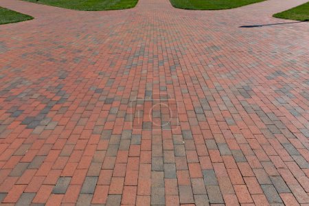 Large brick pathway splitting off into 3 different paths, choices of path to take, creative copy space, horizontal aspect