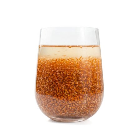 Plantago Ovata Seeds in Glass of Water Isolated. Psyllium Husk, Isabgol Dietary Fiber, Ispaghula, Psyllium Husk and Seeds on White Background, Clipping Path