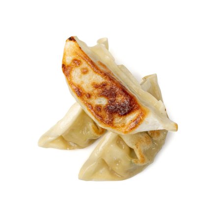 Photo for Gyoza Chinese Dumplings Isolated, Fried Vegetable Jiaozi, Chicken Momo Pile, Asian Gyoza Group on White Background with Clipping Path - Royalty Free Image