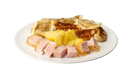 Photo for Gyoza Chinese Dumplings on White Plate, Fried Vegetable Jiaozi with Boiled Potatoes and Canned Meat, Breakfast Lunch Plate, Clipping Path - Royalty Free Image