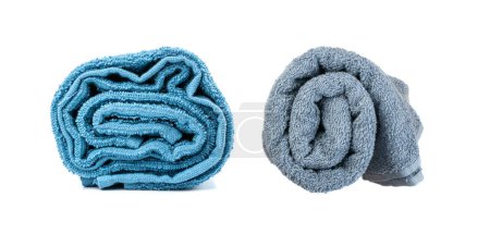Photo for Rolled Blue Towel Isolated. New Terry Cotton Towel, Soft Washcloth on White Background - Royalty Free Image
