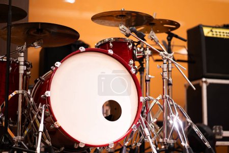 Complete set of red drums in the studio music concept.