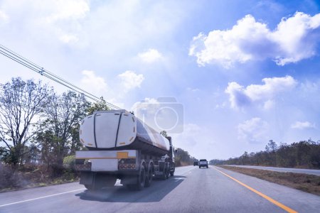 Big oil tanker truck on the road to transport flammable materials