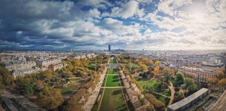 Photo for Panoramic view to the Paris cityscape from the Eiffel tower heights, France. Montparnasse tower and Les Invalides seen on the horizon panorama - Royalty Free Image