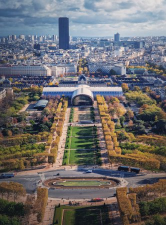 Photo for Scenery view to the Paris city from the Eiffel tower height, vertical background. Montparnasse tower and Les Invalides seen on the horizon, France - Royalty Free Image
