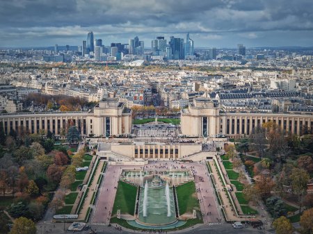 Photo for Sightseeing aerial view of the Trocadero area and La Defense metropolitan district seen at the horizon in Paris, France. Beautiful autumn season colors - Royalty Free Image