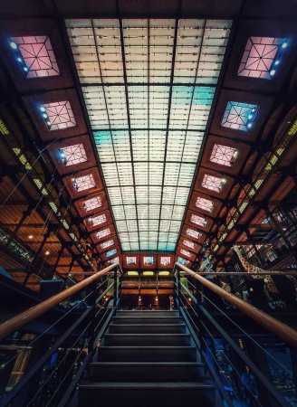 Photo for Staircase inside the Museum of Natural History, Paris, France. Architectural details and glowing glass ceiling - Royalty Free Image