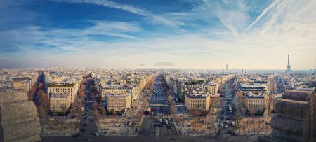 Photo for Wide angle Paris cityscape panorama from the triumphal arch with view to parisian avenues and Champs-Elysee in the center. Beautiful architectural landmarks on the horizon - Royalty Free Image