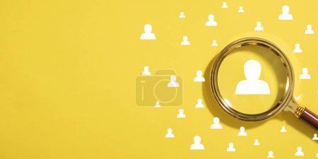 Photo for Magnifying glass with a human symbols. Human Resources - Royalty Free Image