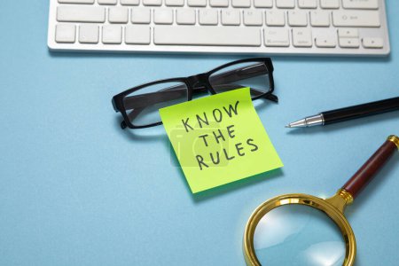 Photo for Know The Rules on sticky note on the blue background. - Royalty Free Image