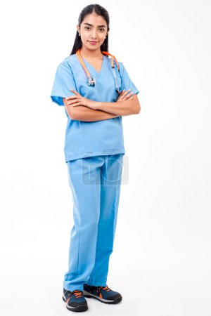 Photo for Young female doctor with crossed hands - Royalty Free Image