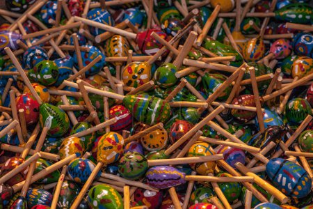 Photo for Colorful wooden maracas at street shop in Antigua, Guatemala. - Royalty Free Image