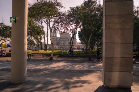 Photo for GUATEMALA, GUATEMALA - 01ST JANUARY, 2022: View of a modern structure located on the 6th avenue next to Centennial Park in the Historic Center of Guatemala City. - Royalty Free Image
