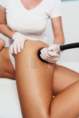 Photo for Vacuum bipolar and multipolar cavitation. Modern technology treatment for health body and beauty improvement for enhancing skin elasticity and fat elimination. - Royalty Free Image