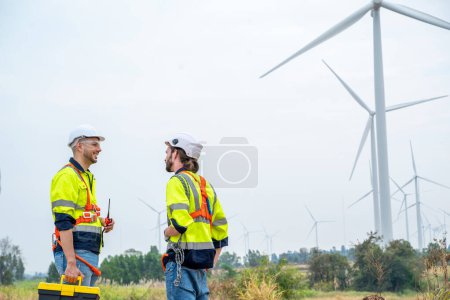 Photo for Technician engineer inspection work at wind turbine electricity industrial,Concept of alternative energy and service. - Royalty Free Image