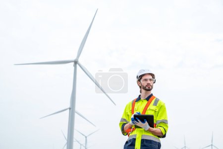 Photo for Technician engineer inspection work at wind turbine electricity industrial,Concept of alternative energy and service. - Royalty Free Image