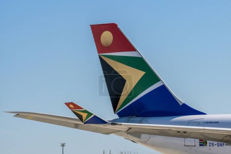 Photo for Frankfurt Germany 11.08.19 Close up at tail and winglet of airbus South African Airways A340 on the runway. - Royalty Free Image