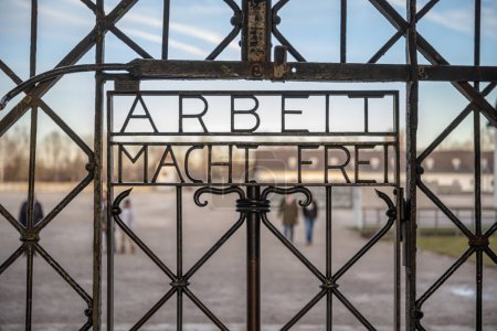 Photo for DACHAU, GERMANY Work sets you free sign on gates at Dachau Concentration Camp. - Royalty Free Image