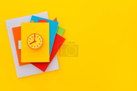 Photo for Stack of notebooks on colorful background. Top view. - Royalty Free Image