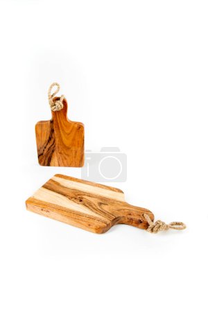 Two small wooden cutting boards isolated over white