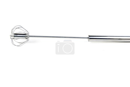 Close up stainless manual egg beating tool isolated over white