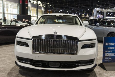 Photo for Chicago, IL, USA - February 17, 2024: White Rolls-Royce Spectre at the Chicago Auto Show. - Royalty Free Image