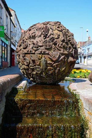Photo for CHARD, UK - JUNE 25, 2023 - Boulder statue by Neville Cable along High Street, Chard, Somerset, UK, Europe, June 25, 2023. - Royalty Free Image