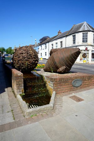 Photo for CHARD, UK - JUNE 25, 2023 - Boulder statues by Neville Cable along High Street, Chard, Somerset, UK, Europe, June 25, 2023. - Royalty Free Image