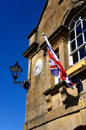 Photo for Window and stone detail on the front of the Market House also known as Martock town hall along Church street in the village centre, Martock, Somerset, UK, Europe - Royalty Free Image