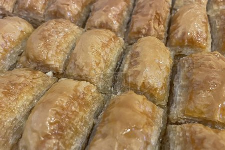 A Feast of Taste. You are Invited to a Dessert Feast with Fresh Baklava Slices. The Best of Traditional Tastes, Fresh Baklava Slices.