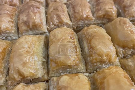 A Feast of Taste. You are Invited to a Dessert Feast with Fresh Baklava Slices. The Best of Traditional Tastes, Fresh Baklava Slices.