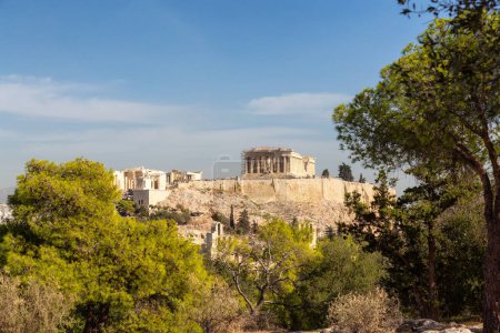 Photo for Historic Landmark, Odeon of Herodes Atticus, in the Acropolis of Athens, Greece. Sunny Day viewed from Philopappos Hill. - Royalty Free Image