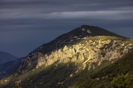 Photo for Rocky Mountain Landscape Background. Sunset Sky with Sunrays. Near Dorgali, Sardinia, Italy. - Royalty Free Image
