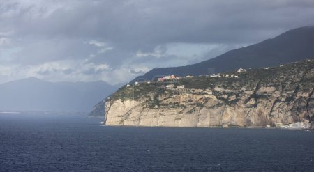 Photo for Rocky Coast and Homes in Touristic Town, Sorrento, Italy. Amalfi Coast. Sunny Evening - Royalty Free Image