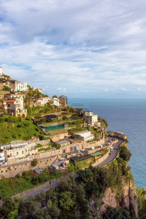 Photo for Touristic Town, Amalfi, on Rocky Cliffs and Mountain Landscape by the Tyrrhenian Sea. Amalfi Coast, Italy. - Royalty Free Image