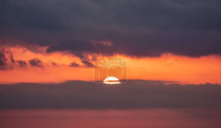 Photo for Dramatic Colorful Sunrise Sky over Mediterranean Sea. Abstract Red Sky. Cloudscape Nature Background. - Royalty Free Image