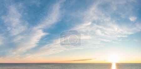 Téléchargez les photos : Dramatic Colorful Sunset Sky over Mediterranean Sea. Cloudscape Nature Background. - en image libre de droit