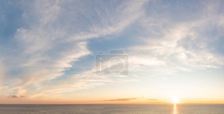 Foto de Dramatic Colorful Sunset Sky over Mediterranean Sea. Cloudscape Nature Background. - Imagen libre de derechos