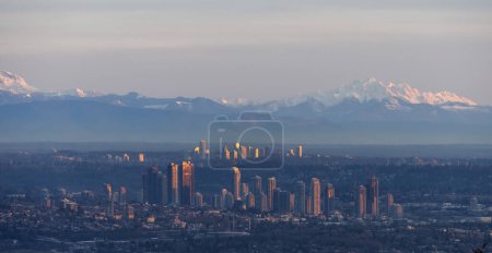 Photo for Brentwood Centre, City and Mountain Landscape in Background. Winter Sunset. View from Cypress Lookout, West Vancouver, BC, Canada. - Royalty Free Image