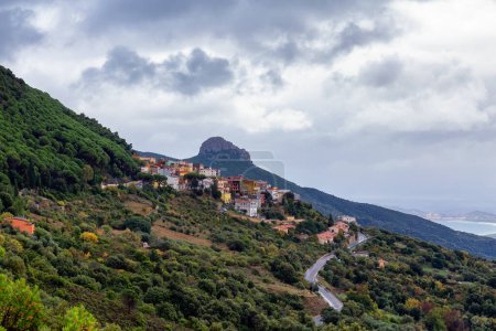 Téléchargez les photos : Small Touristic Town, Baunei, in the Mountains of Sardinia, Italy. Cloudy Rainy Day. Fall Season - en image libre de droit
