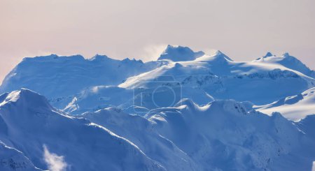 Foto de Snow and Cloud covered Canadian Nature Landscape Background. Winter Season in Whistler, British Columbia, Canada. From Blackcomb Mountain - Imagen libre de derechos