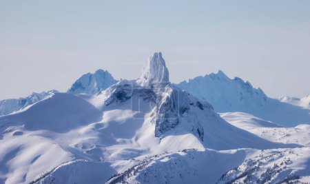 Téléchargez les photos : Snow covered Canadian Nature Landscape Background. Black Tusk. Winter Season in Whistler, British Columbia, Canada. From Blackcomb Mountain. - en image libre de droit