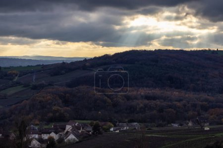 Foto de Farm Lands on top of a hill in countryside. France, Europe. Sunny Sunset. - Imagen libre de derechos