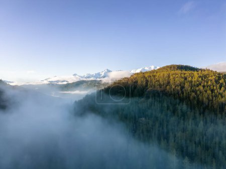 Photo for Canadian Mountain Landscape Nature Background. Aerial View. Sunny Winter Sunrise. Near Squamish, BC, Canada. - Royalty Free Image